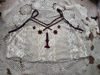 Image 1 of lace with candle
