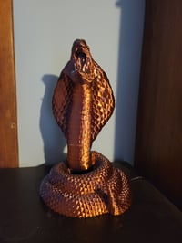 Image 1 of Snake headphone holder