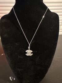 silver rhinestone cc necklace 