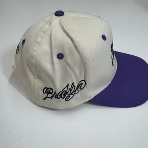 Image of Purple brim 