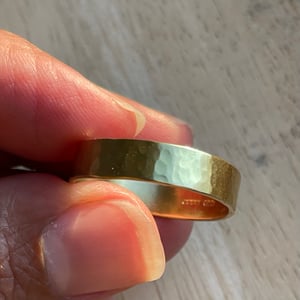 Image of Hammered 18ct yellow gold wedding band