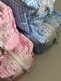 Image 1 of plaid makeup bags