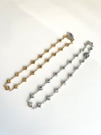 Image 2 of Gold VS Silver Diamond