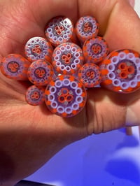Image 1 of Orange and milky blue stripes with a UV center 