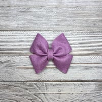 Image 1 of Flouncy Felt 3.5” bows 