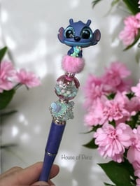 Image 1 of Alien With Doll Pen