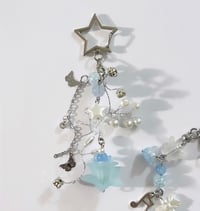 Image 2 of Laufey A Matter Of Time Keychain + Bracelet