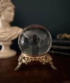 Boule de cristal de 13cm et son support en bronze massif du XIXème siecle, têtes de lions.