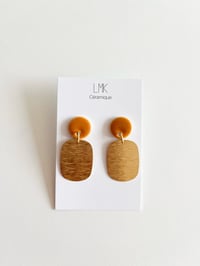 Paire de boucles d'oreilles céramique et plaqué or PLACA miel