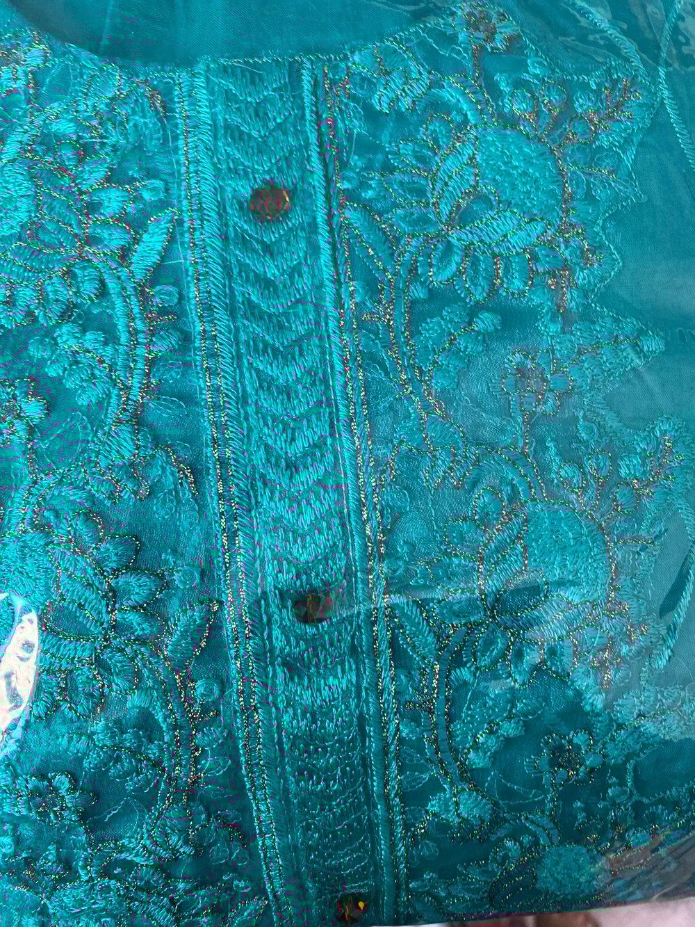 Turquoise/blue suit  