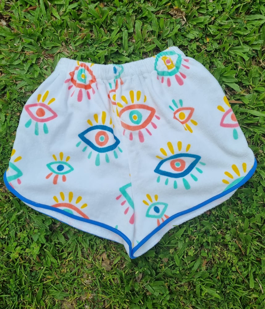 Image of TERRY SHORTS EYE SPY. Size Extra Small & Small available 