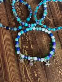 Image 8 of Star Shine Sea Glass Aura Blue and Teal Tumbler Bracelet Stack