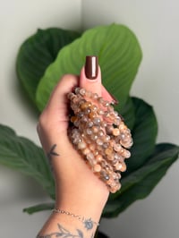 Image 1 of FACETED PEACH MOONSTONE BEADED BRACELETS 5MM