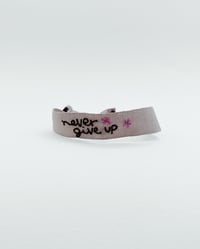 Image 1 of Bracciale Tortora Never Give Up