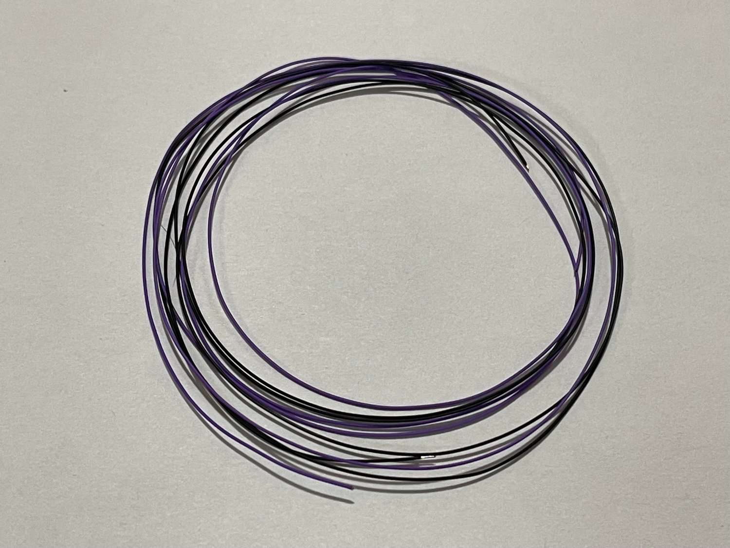 Spark plug wire material purple-black