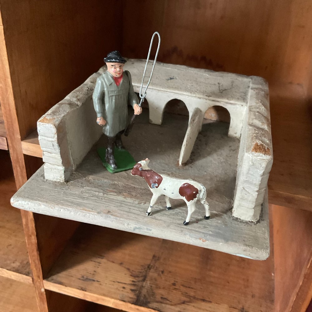 Image of Farmer,Calf & Shelter