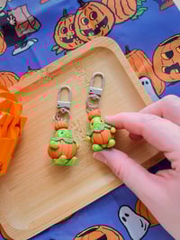 Image 1 of Sapeaux Little Guy Pumpkin Charm