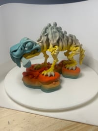 Image 1 of Flex Dino