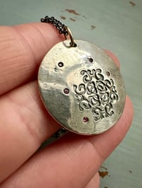 Image 12 of sapphire pendant with hand engraved Shakespeare quote