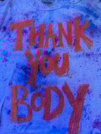 Image 2 of Purple and blue multi colour tight 70s style t shirt with orange text (size 12)