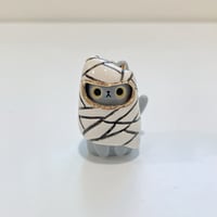 Image 1 of Glow in dark mummy gray cat ceramic figurine