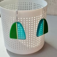 arc single drop earrings