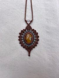 Image 1 of macrame necklace with tigers eye and clear quartz bead