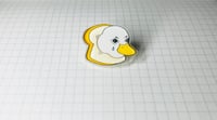 Image of Crying Duck Stuck In A Bread Pin