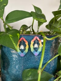 Image 1 of blooming pride flower
