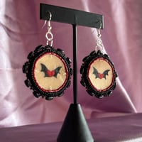 Image 3 of bat heart beaded parfleche earrings