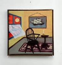 Windsor chair by the window