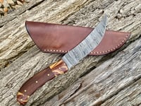 Image 1 of Damascus knife with Buffalo leather sheath.