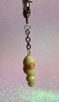 Image 1 of glo worm charm 