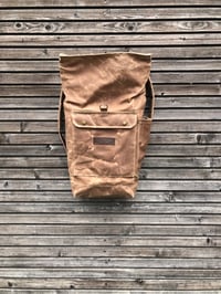 Image 4 of Waxed canvas rucksack / waterproof backpack with roll up top and double waxed bottom