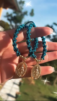 Blue twist Virgencita bracelets