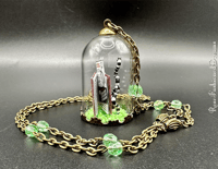 Image 7 of Uranium Handbook For The Recently Deceased Glass Dome Neckalce With Wooden Hanger