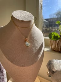Image 1 of Gold Moss Agate Moon Crystal Necklace