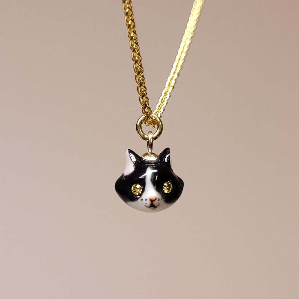 Image of Tuxedo Porcelain & Gold Vermeil Teeny Tiny Cat Pendant