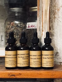 Herb Infused Body, face + Hair oils