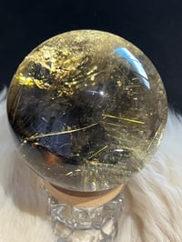 Image 23 of Golden Rutile In Smoky Quartz Sphere #1769