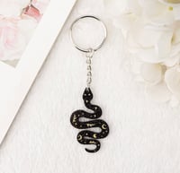 SELENOPHILE EARRINGS & KEYCHAINS