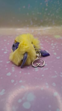 Image 2 of Light purple and yellow Fluffennutter keychain