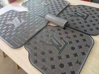Black and grey car mats 