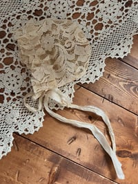 Image 2 of Antique Beige Lace Newborn Bonnet Silk Tie