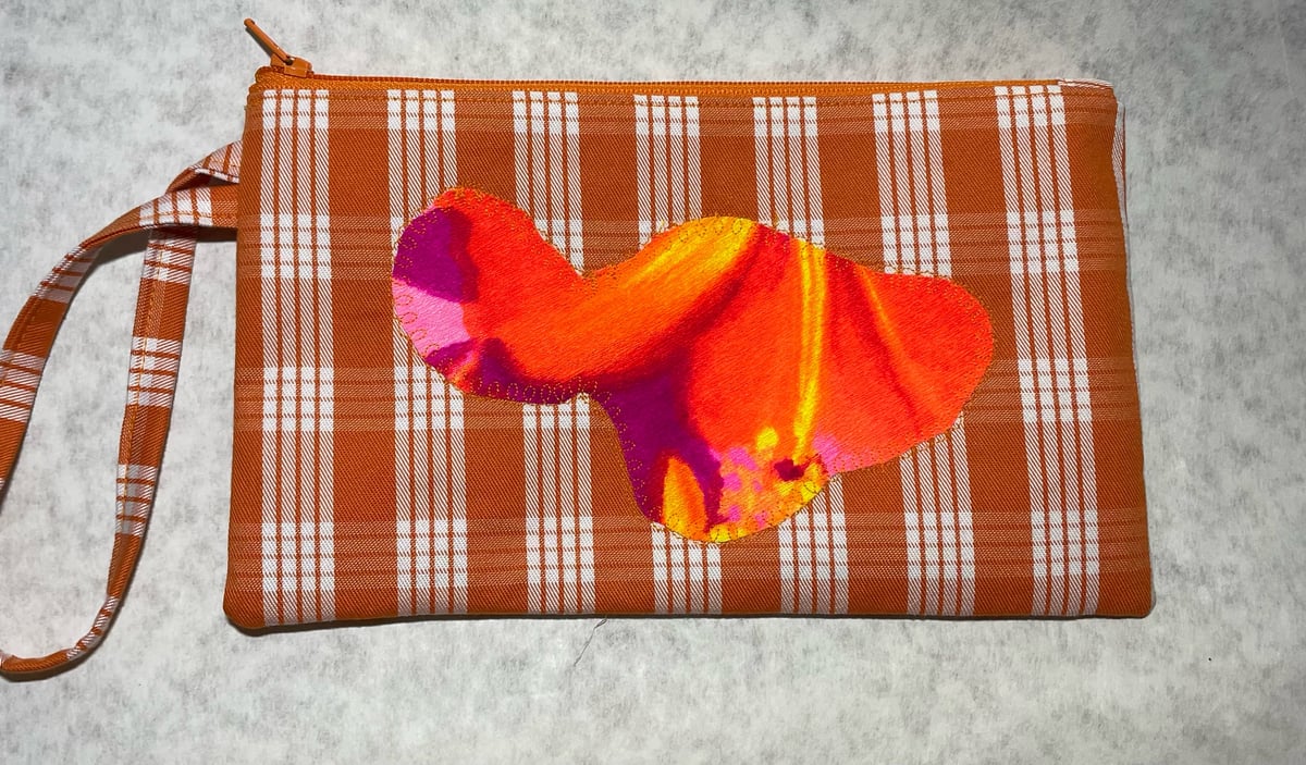 Image of Orange Palaka clutch with Maui Island