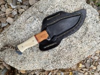 Image 2 of 512 layer Damascus knife with cross body sheath.