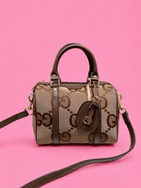 Brown Gugu bowling bag 