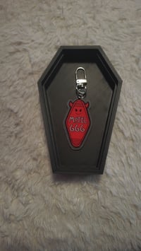 Image 1 of Motel 666 bag charm