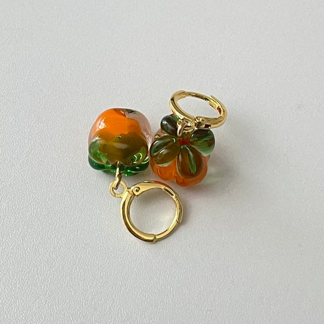 'glass persimmon' huggie hoop earrings