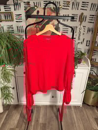 Image 1 of Red bow sleeve sweater 